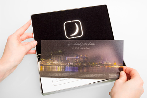 The Photonight voucher in the gift box